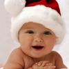 Baby met kerstman muts